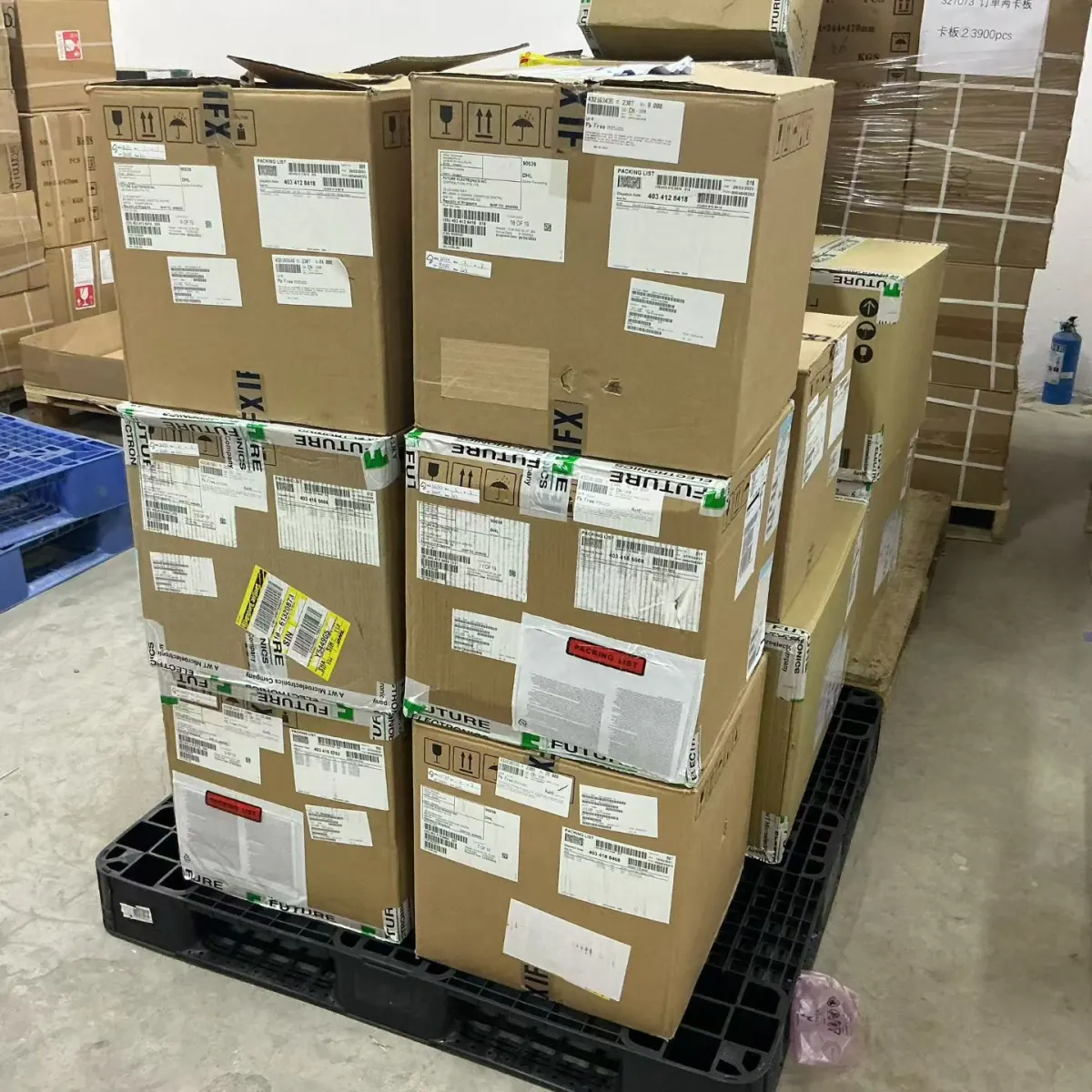 Palletised cartons of electronic components with packing lists