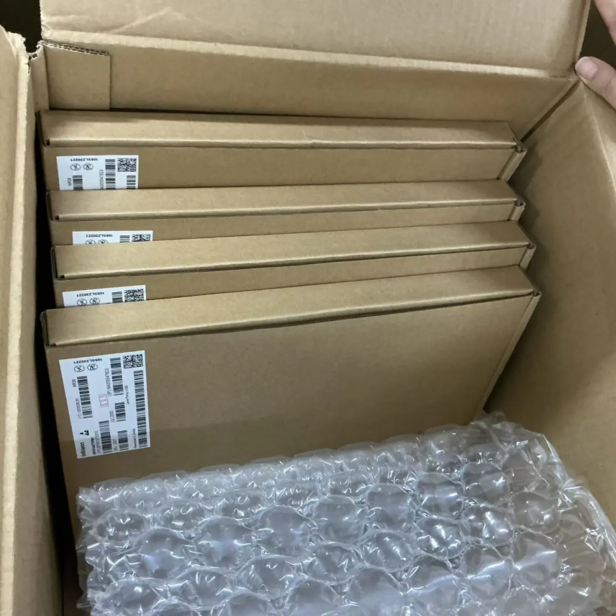 Boxed components packed upright with air cushion protection