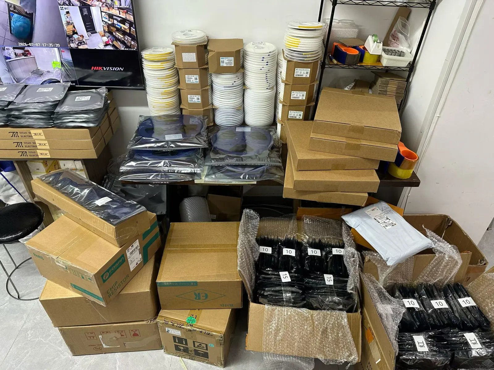 Reels, moisture barrier bags and boxed parts grouped for order preparation